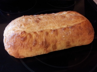 Loaf of freshly baked sourdough bread.